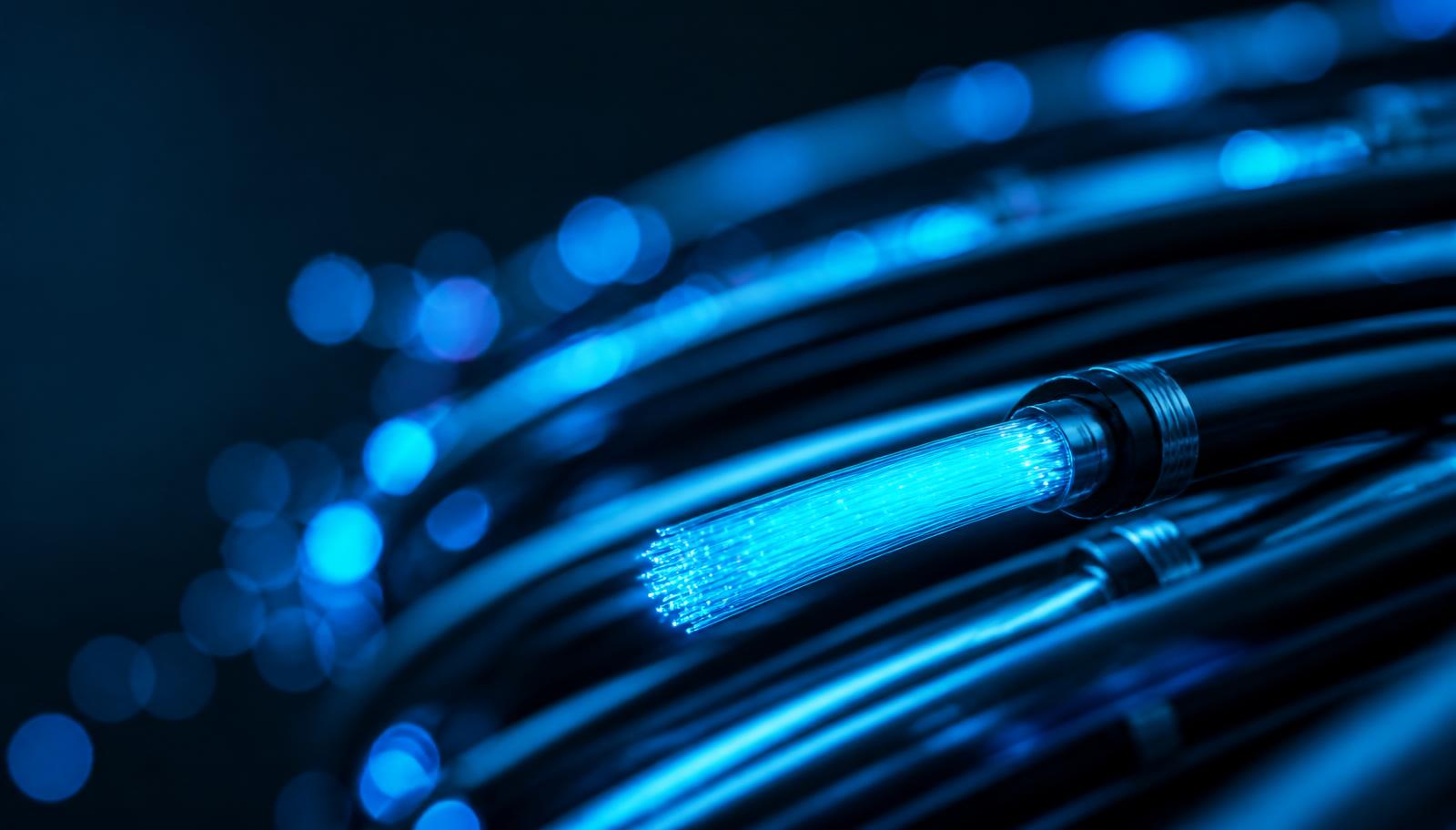 UK network operations centre with fibre infrastructure monitoring dashboards